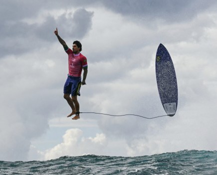 TOPSHOT - Brazil's Gabriel Medina reacts after getting a large wave in the 5th heat of the men's surfing round 3, during the Paris 2024 Olympic Games, in Teahupo'o, on the French Polynesian Island of Tahiti, on July 29, 2024. (Photo by Jerome BROUILLET / AFP) (Photo by JEROME BROUILLET/AFP via Getty Images)