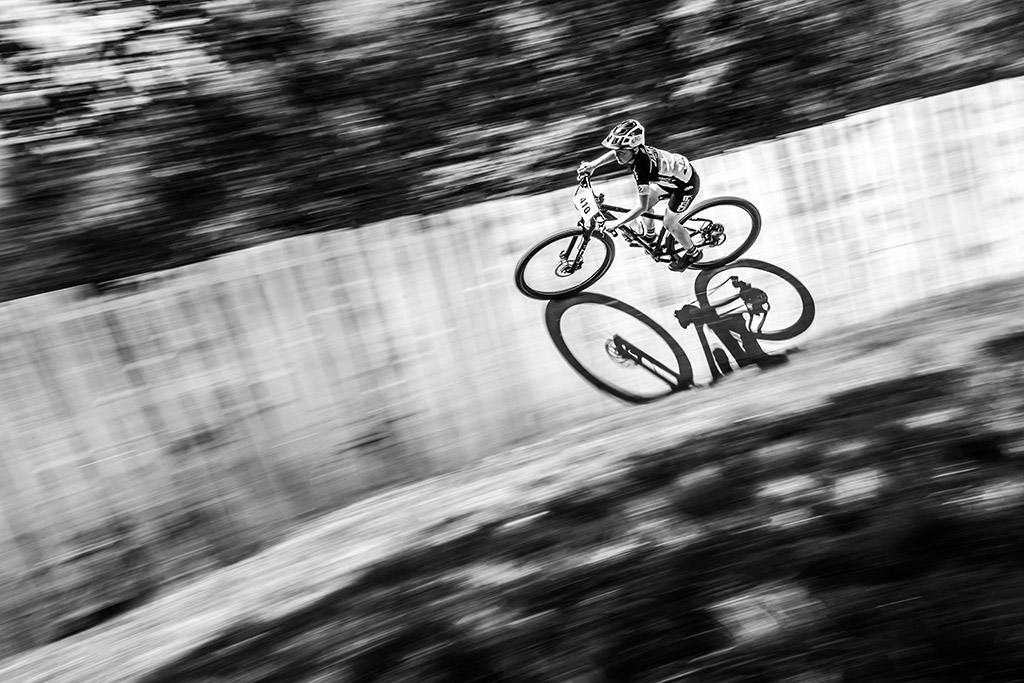 top-down angle of cyclist on path