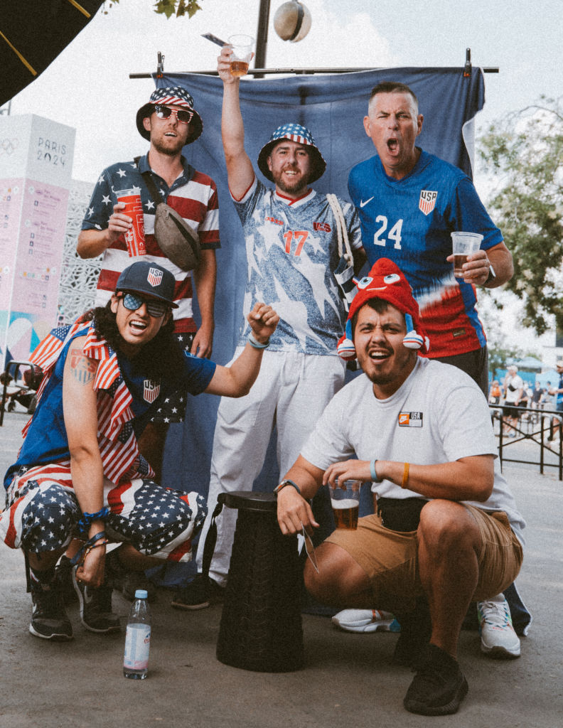 Fans pose for a portrait during the Olympic Games in Paris