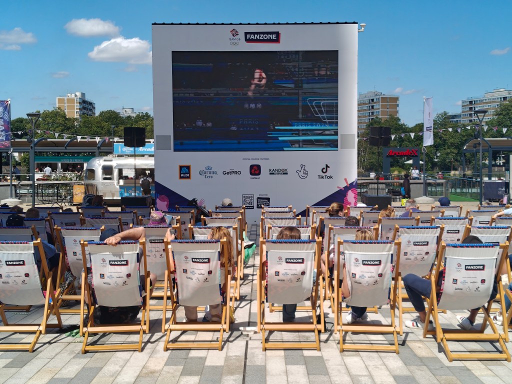 People watch the Paris 2024 Olympic Games outside Battersea Power Station in London, UK. Photo taken with OnePlus Nord 4.