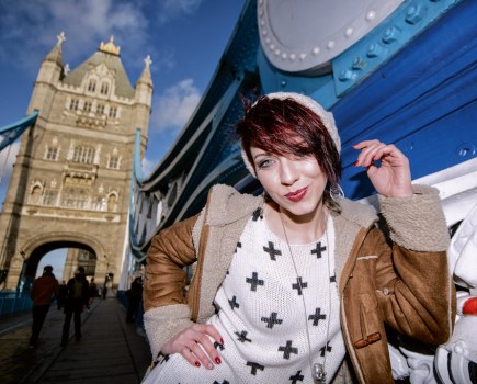 Speedlight portrait of a woman on the Tower Bridge