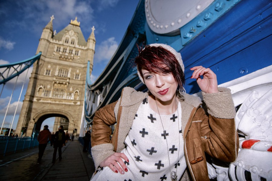 Speedlight portrait of a woman on the Tower Bridge