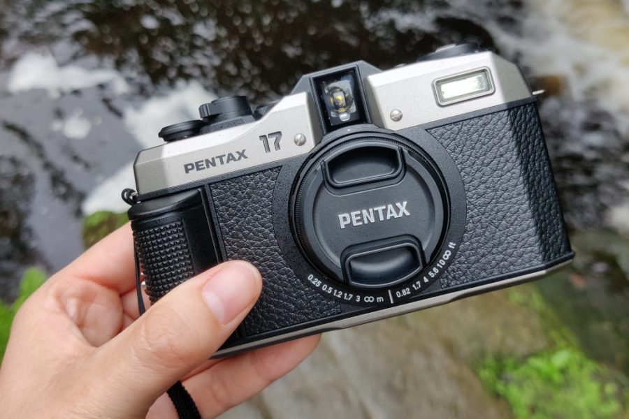 pentax 17 with lens cap on in hand