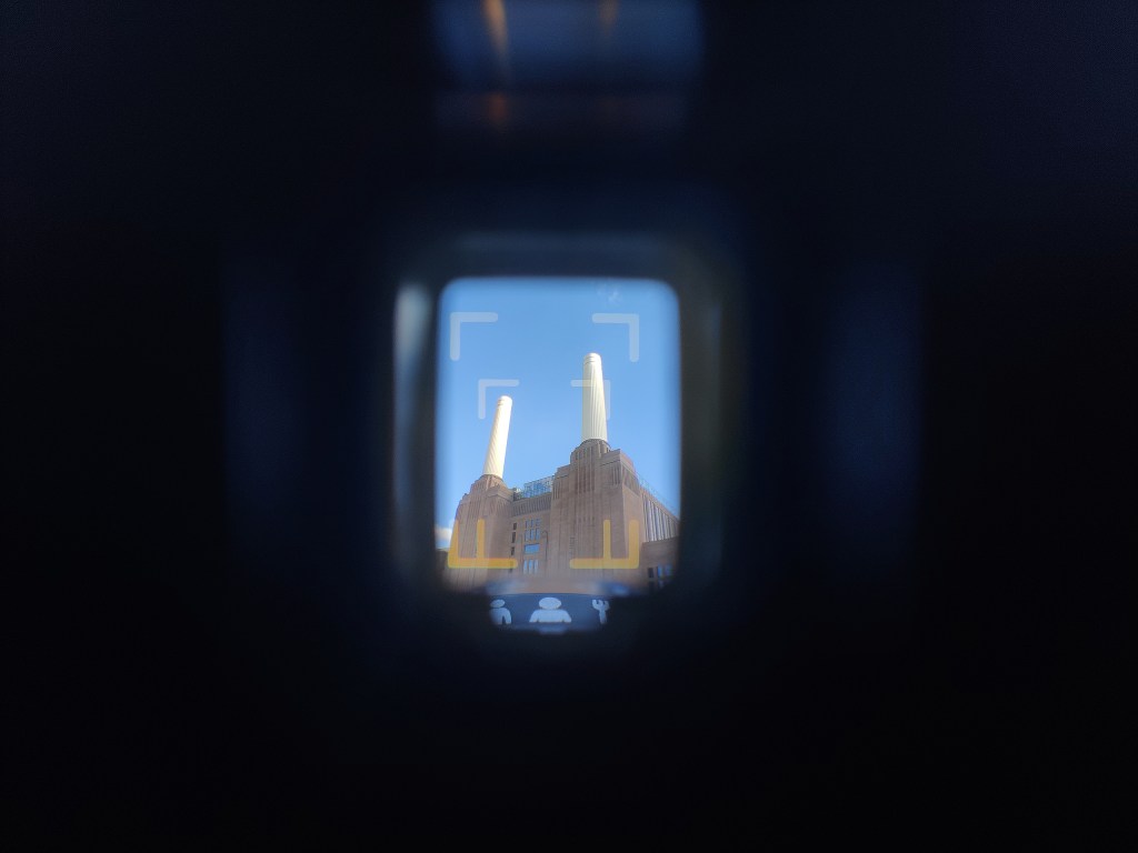 looking through pentax 17 viewfinder at battersea power station