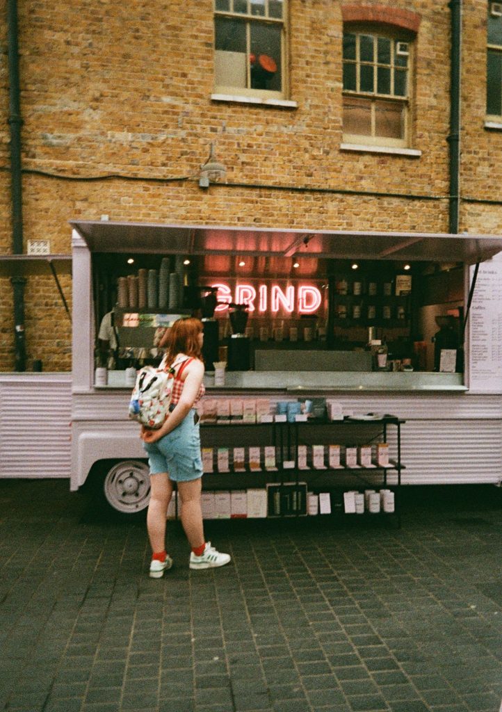 Person waiting at grind coffee van