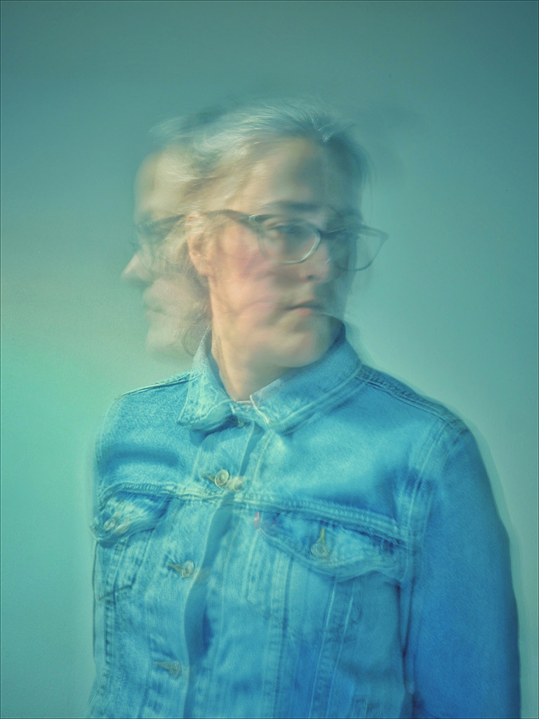 Alison McCondichie portrait with intentional camera movement blur photo entitled Blue Motion