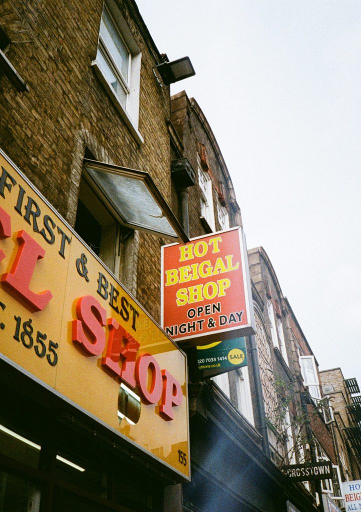 looking up at beigal shop sign