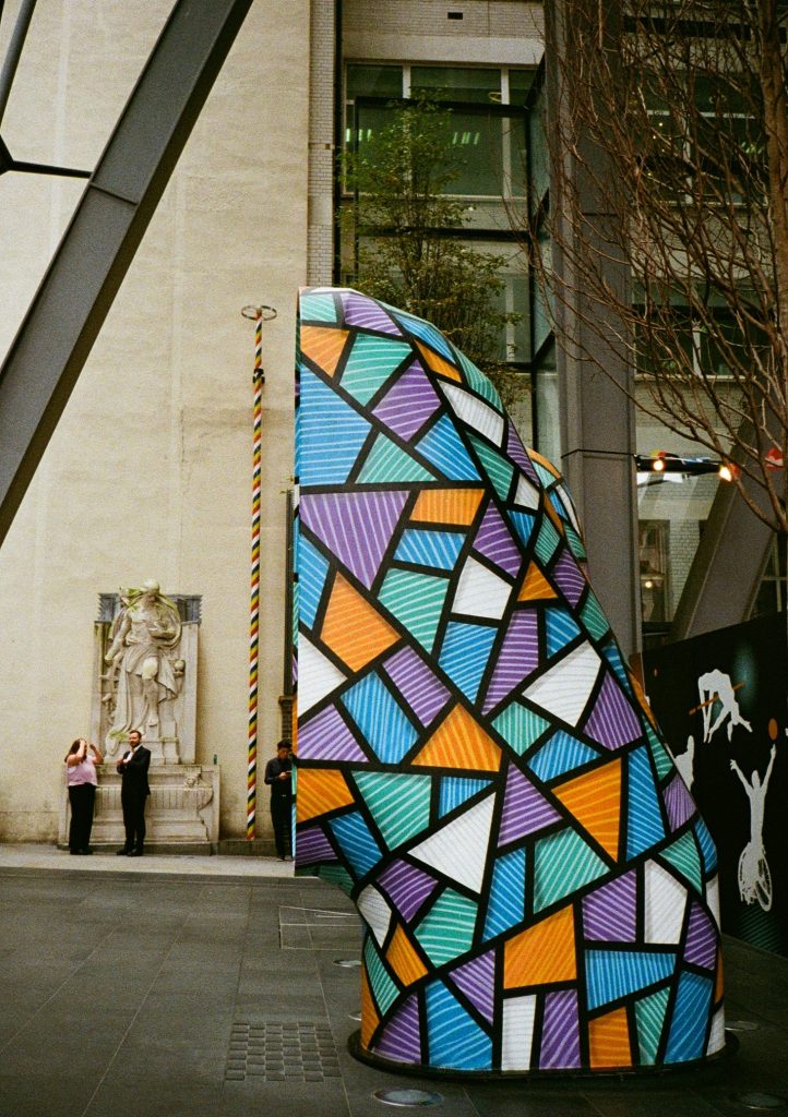 sculpture covered in colourful geometric patterns