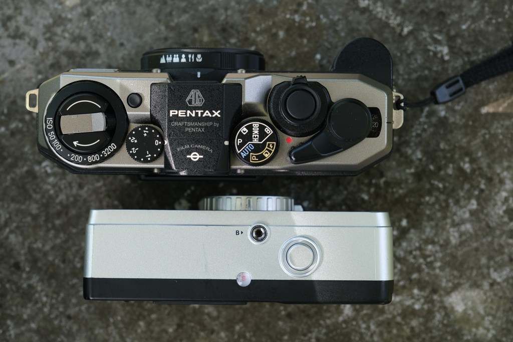 top panel of pentax and kodak half frame cameras