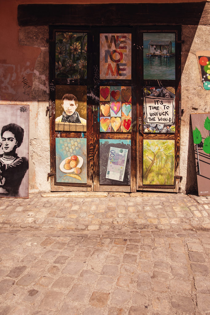 travel photography, a door with colourful retro posters on it