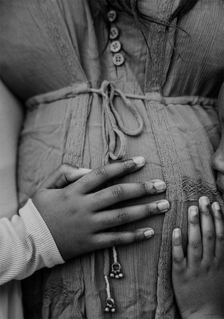 small childs hands on pregnant woman belly close up 70:15:40 project winner