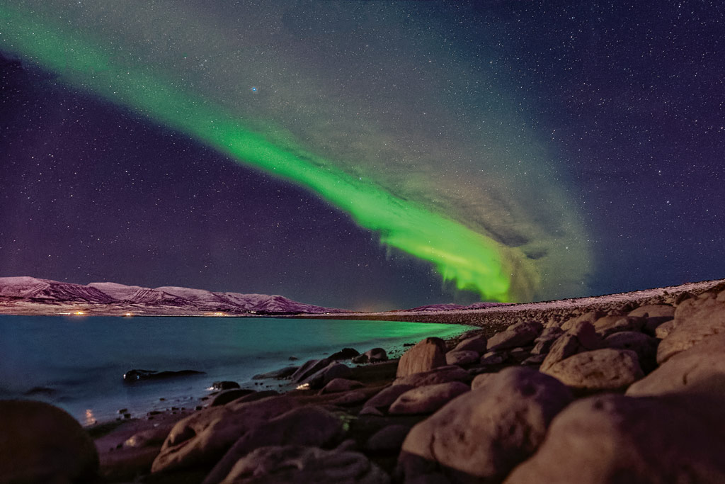 What to pack for travel photography, green aurora image in Iceland