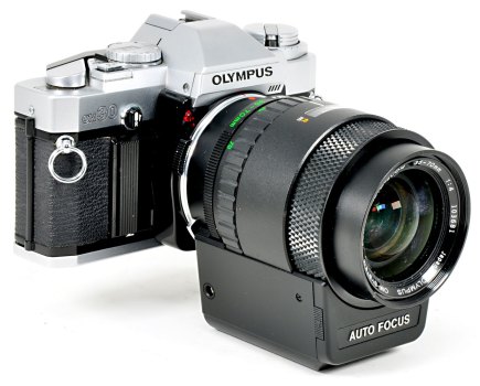 The Olympus OM30 with is purpose-made autofocus zoom lens. Photo John Wade.