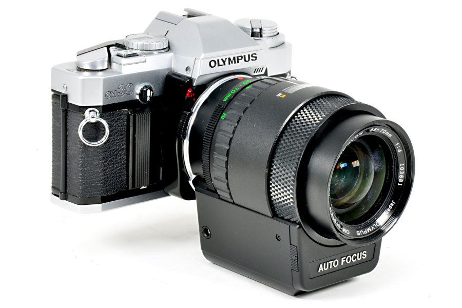 The Olympus OM30 with is purpose-made autofocus zoom lens. Photo John Wade.