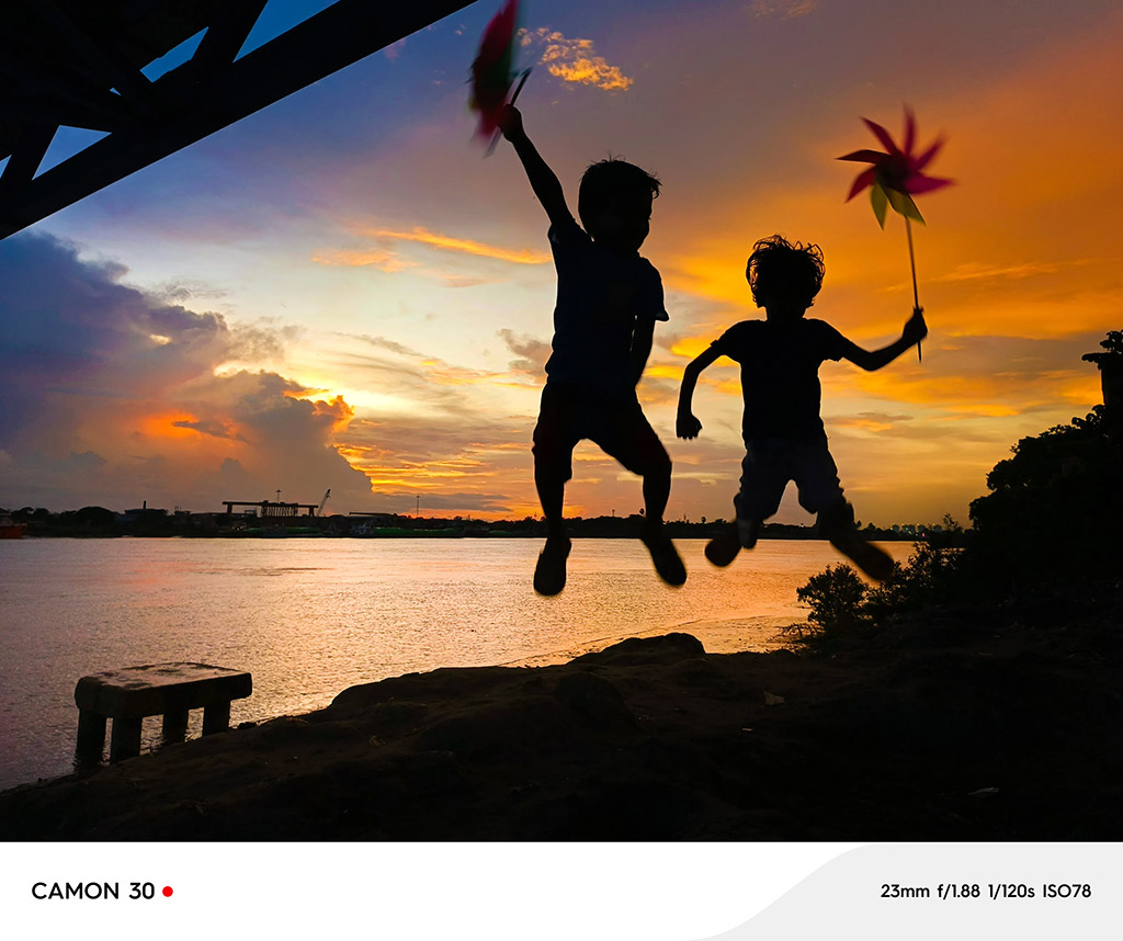 ap x tecno shot on camon tecno master photographer winner two children jumping in the air at sunset