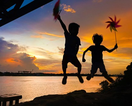 ap x tecno shot on camon tecno master photographer winner two children jumping in the air at sunset