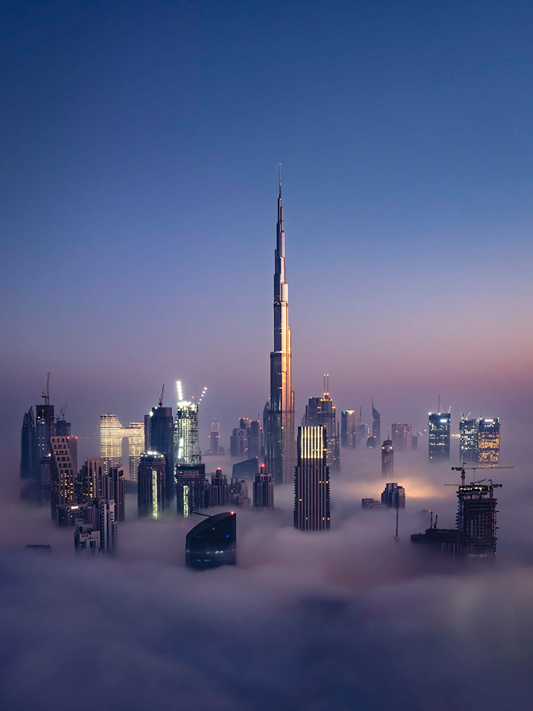 Burj Khalifa emerging gracefully from the mist