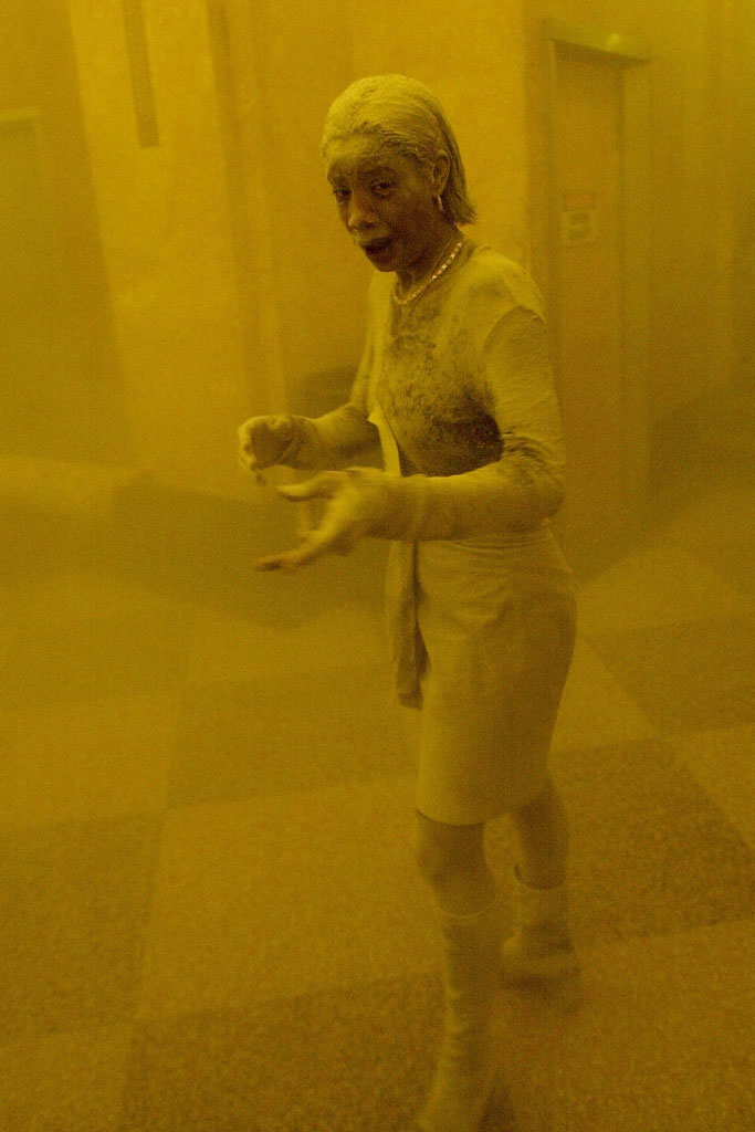 Marcy Borders by Stan Honda 11th September 2001, a woman completely covered in yellow dust. The most significant moments of the last 25 years 