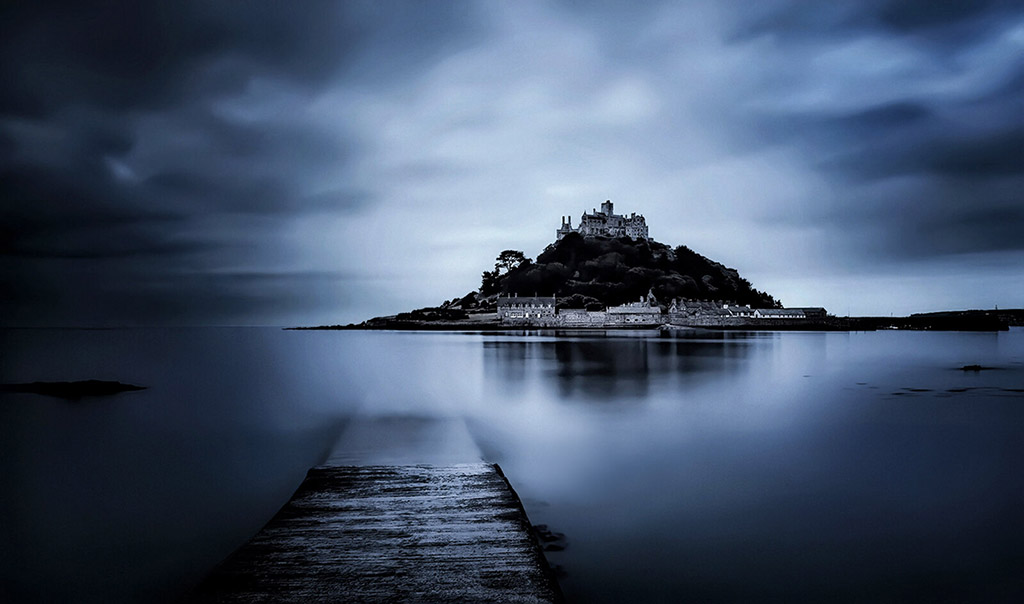 st michaels mount with high tide low ight and clouds