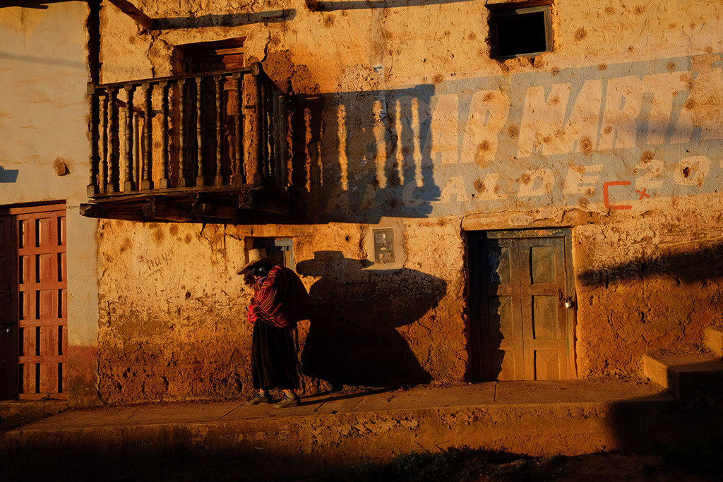 street scene of golden light and dark contrasts