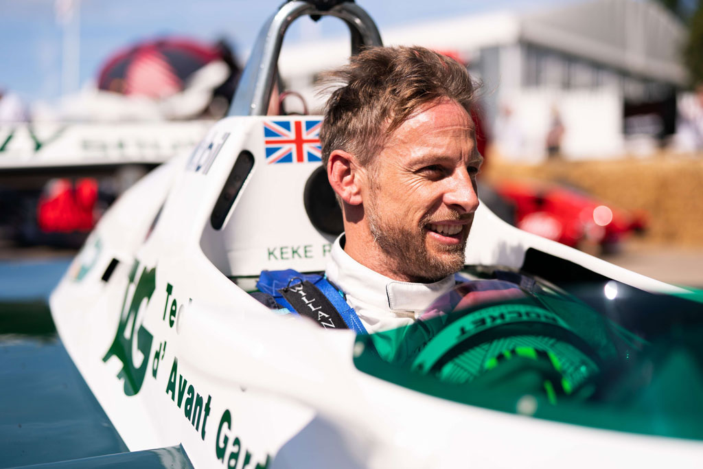 portrait of a man in a F1 car