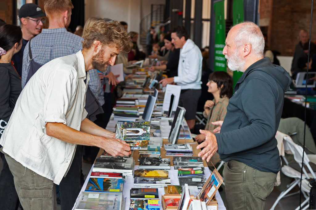 Two men at a photo fair