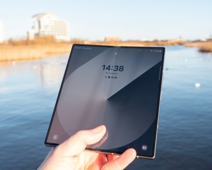 The Samsung Galaxy Z Fold 6 unfolded in front of a landscape