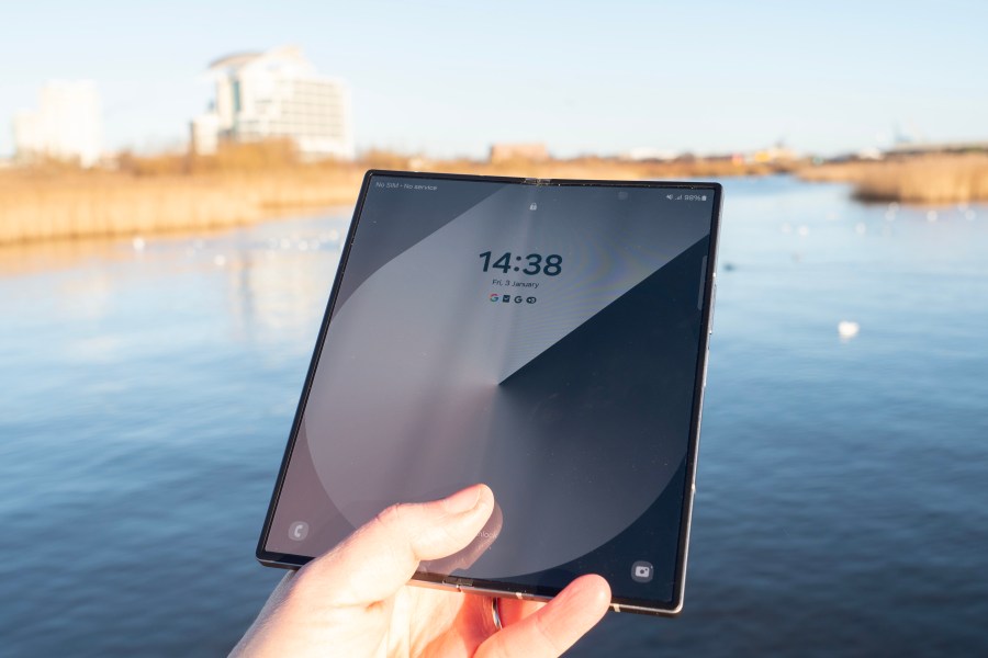 The Samsung Galaxy Z Fold 6 unfolded in front of a landscape