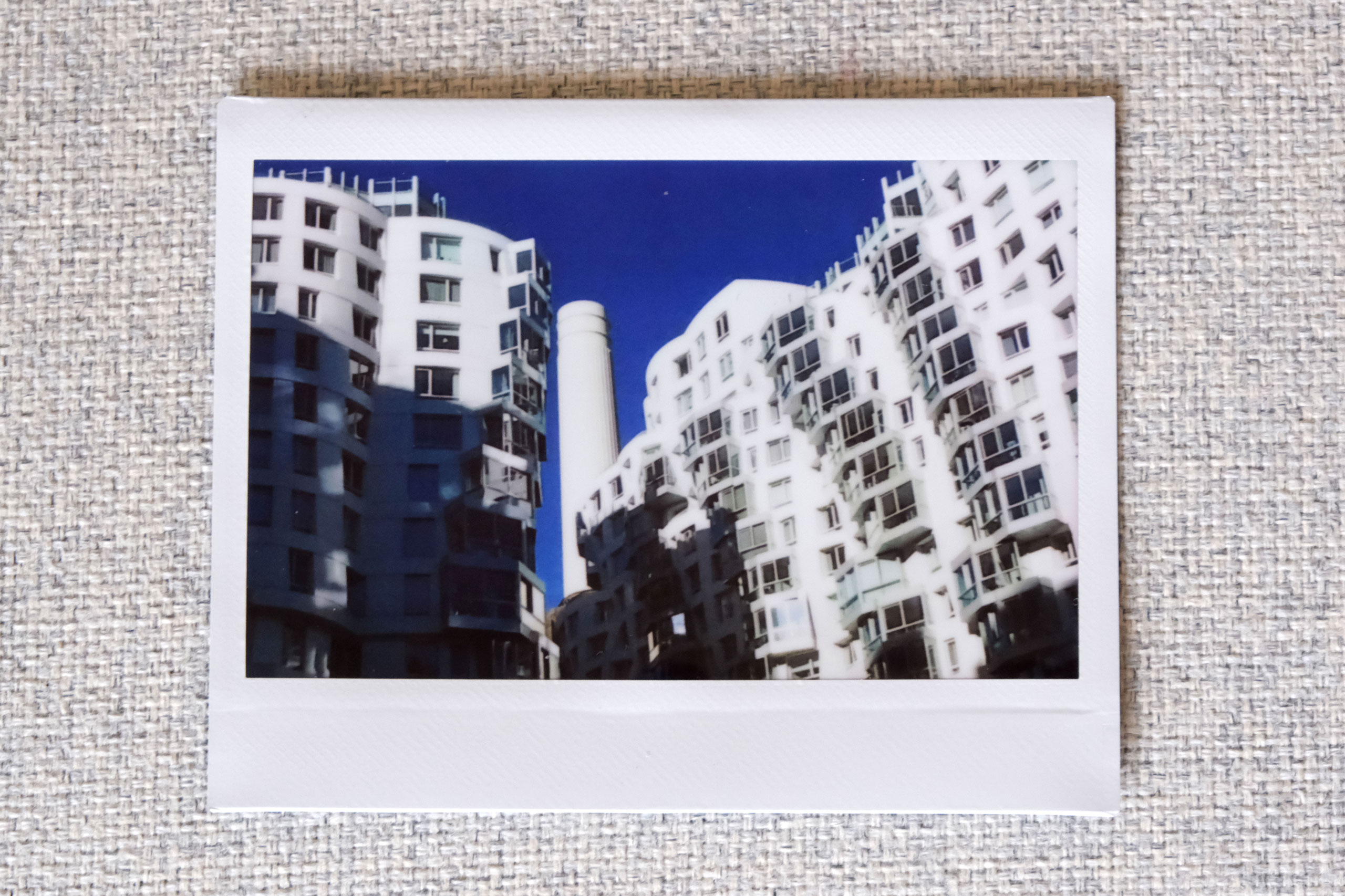 Sample photo of buildings near Battersea Power Station, Instax Wide Evo.