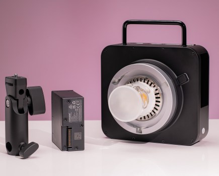 Neewer Q4 photography light, flash unit, and battery