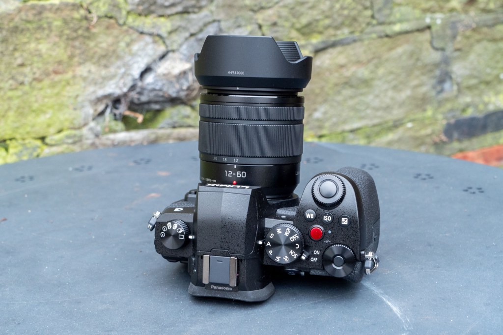 Panasonic Lumix G97 on a metal table, top view