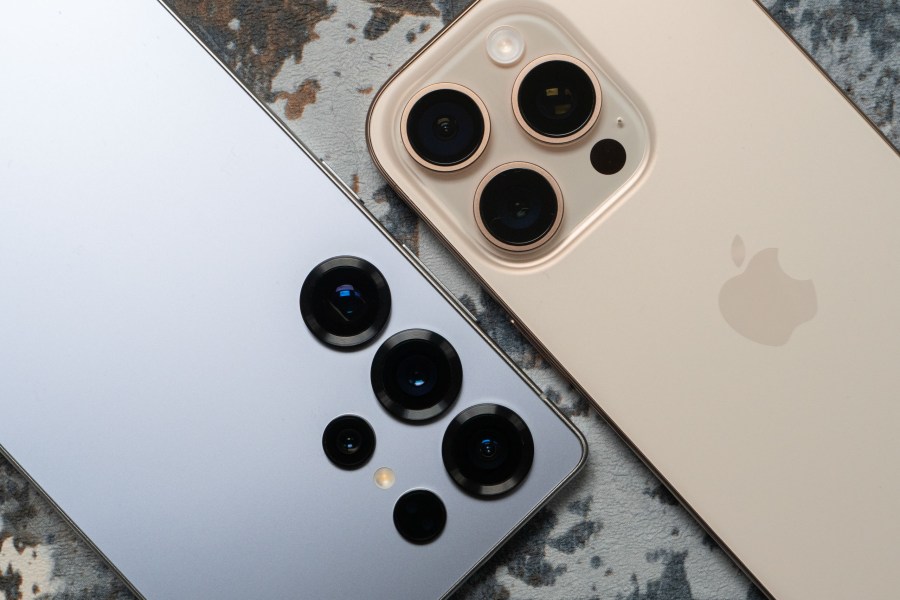 A close up of the lenses of the Samsung Galaxy S25 Ultra and the iPhone 16 Pro