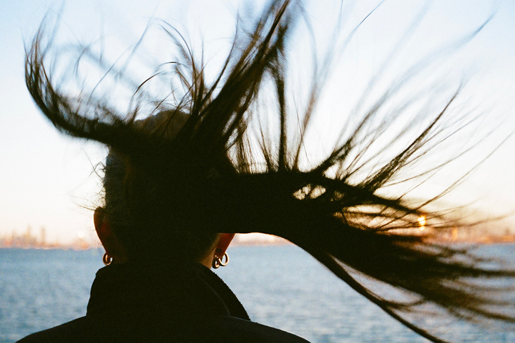 Hair.
Camera: Konica Hexar AF
Film: 35mm, Kodak Portra 400
November 2024 on the Staten Island Ferry, New York City. Image: Cal Holland hair blowing in the wind 