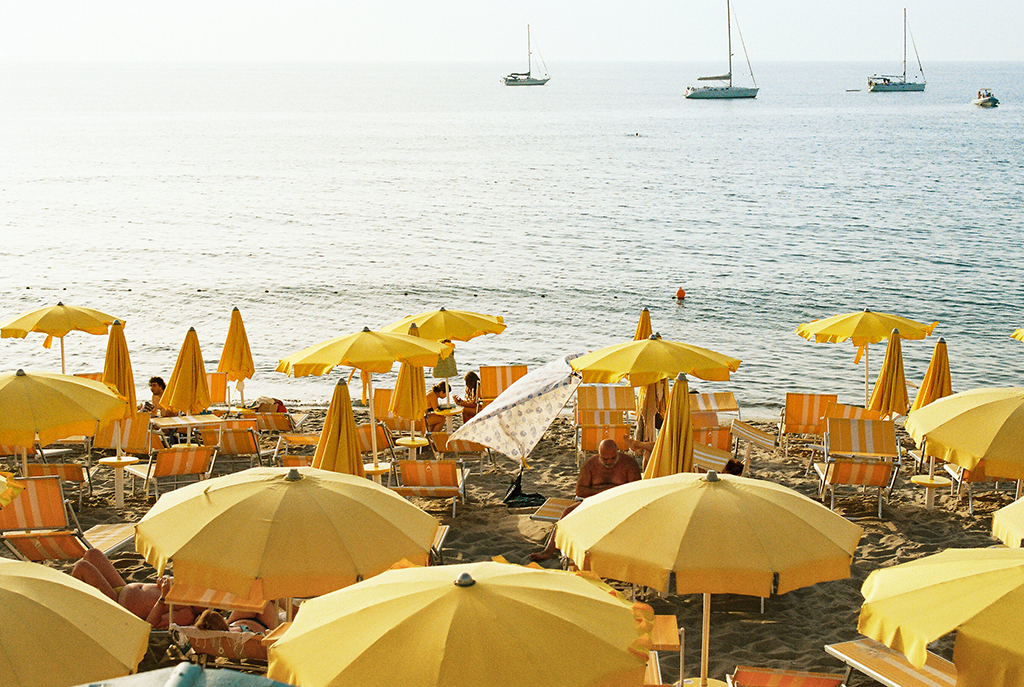 film photo in italyyellow umbrellas on the beach