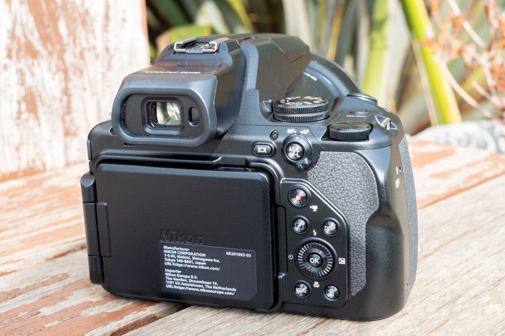 The back of the Nikon P1100, with the screen folded in on itself