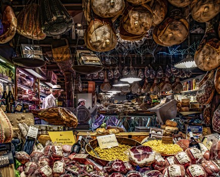 deli market stall with loads of food produce on show