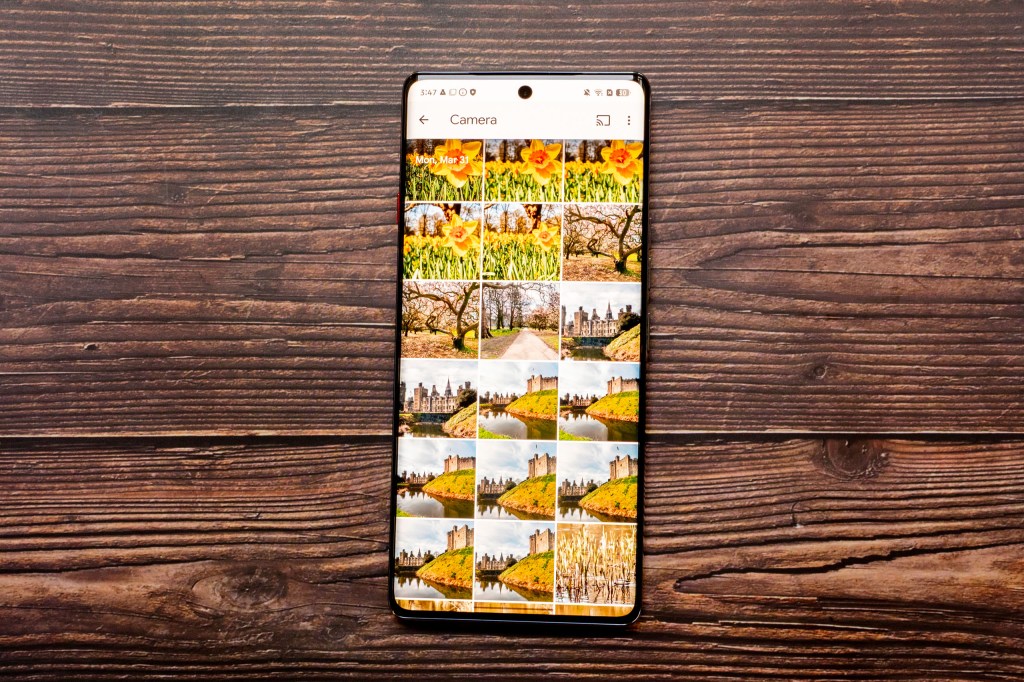 The Camon 40 Pro with the screen switched on, showing a gallery of images taken with the onboard cameras