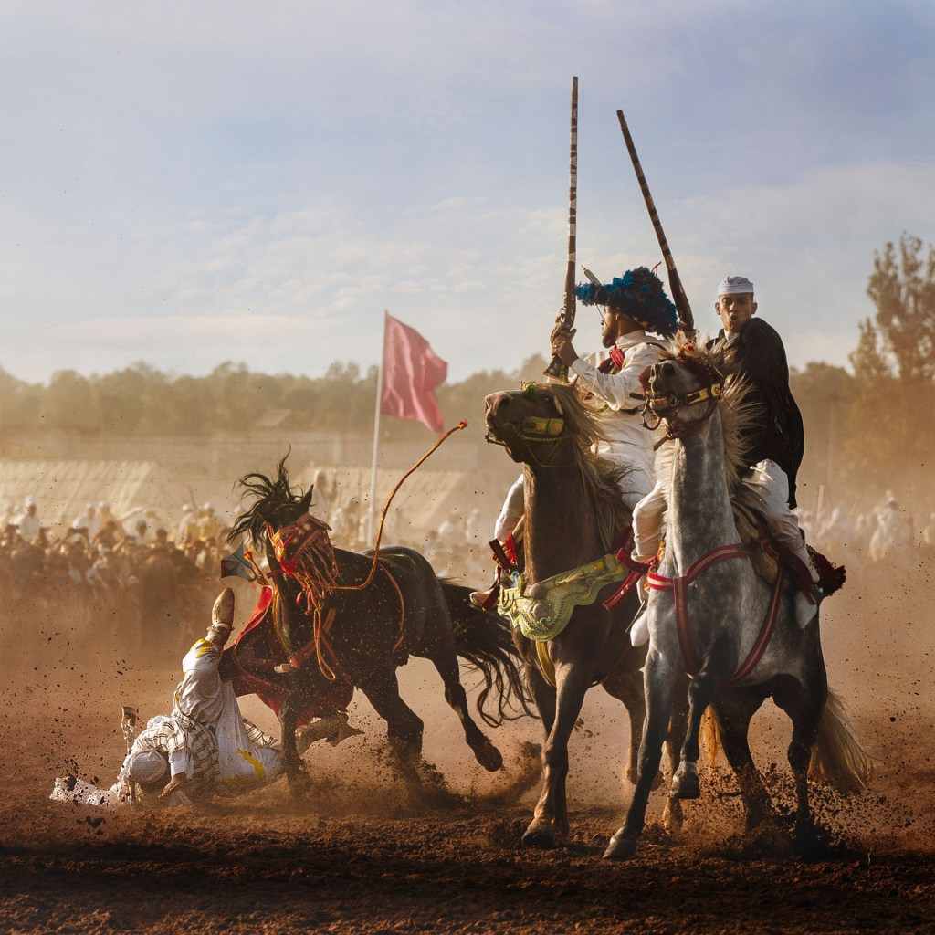 Many of the photographs taken during a traditional Moroccan ‘tbourida’ show the riders firing their rifles. With this image, the photographer wanted to share another side of the event, and show how dangerous it can be when a rider is thrown from their mount.