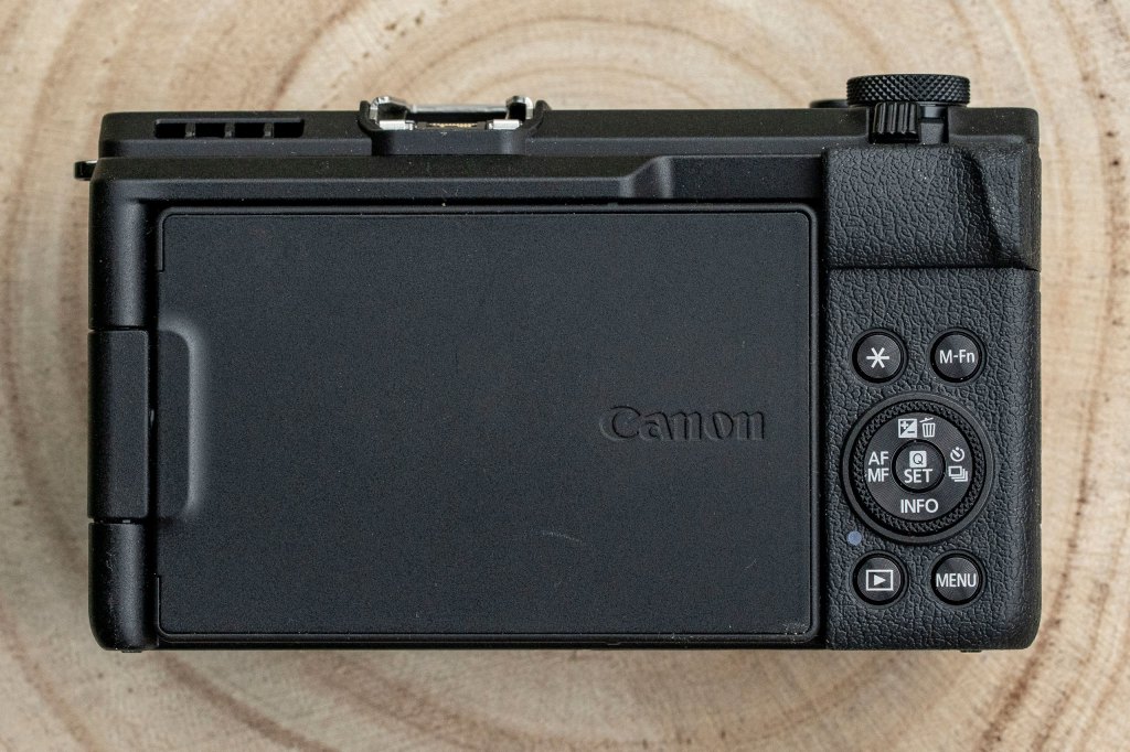 Canon PowerShot V1 back view with screen folded in.
