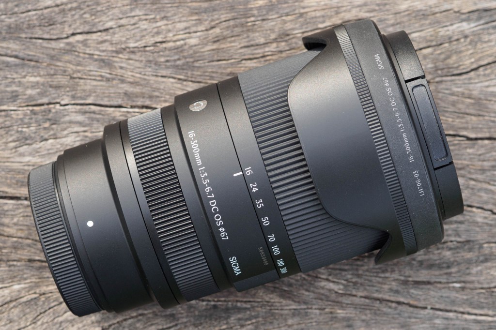 Sigma 16-300mm F3.5-6.7 DC OS with caps and hood reversed for transport