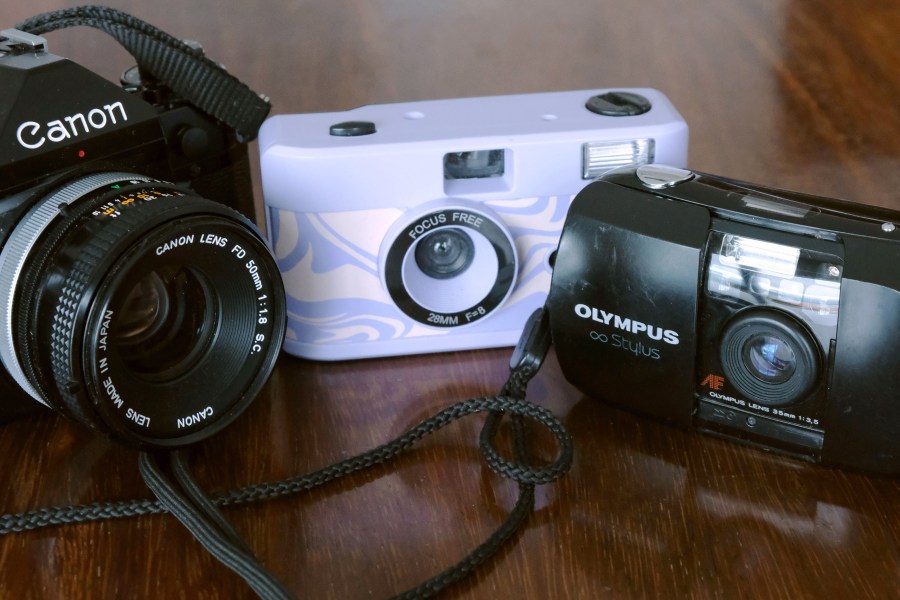 From left to right: Canon A-1, Urban Outfitters camera, and Olympus Mju I. Image credit: Isabella Ruffatti