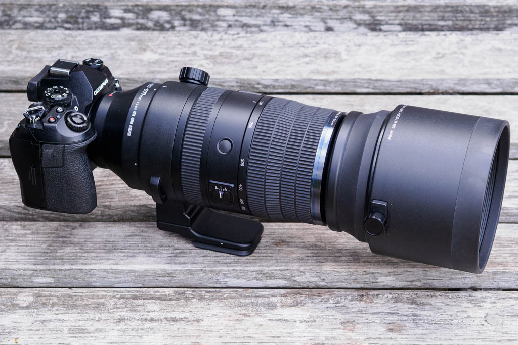 OM System 150-600mm F5-6.3 IS with hood attached. 