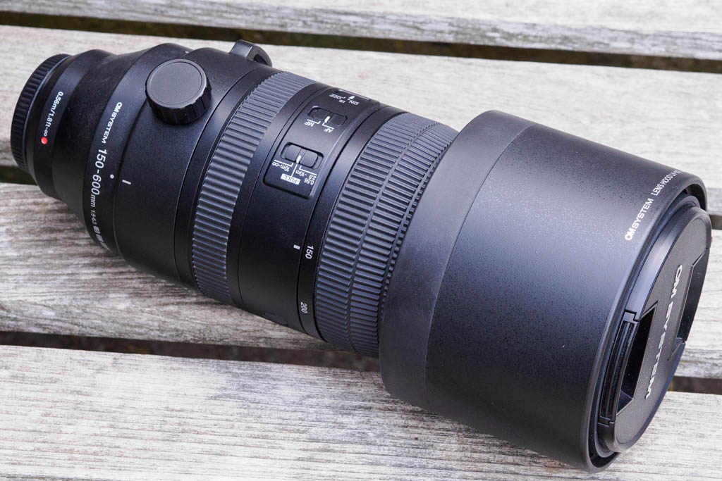 OM System 150-600mm F5-6.3 IS packed with caps and hood