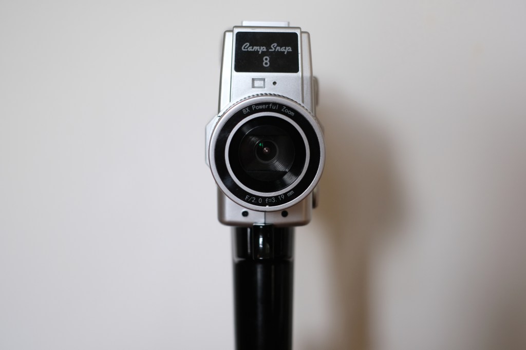 Photograph of Camp Snap CS-8 video camera directly facing the viewer.
