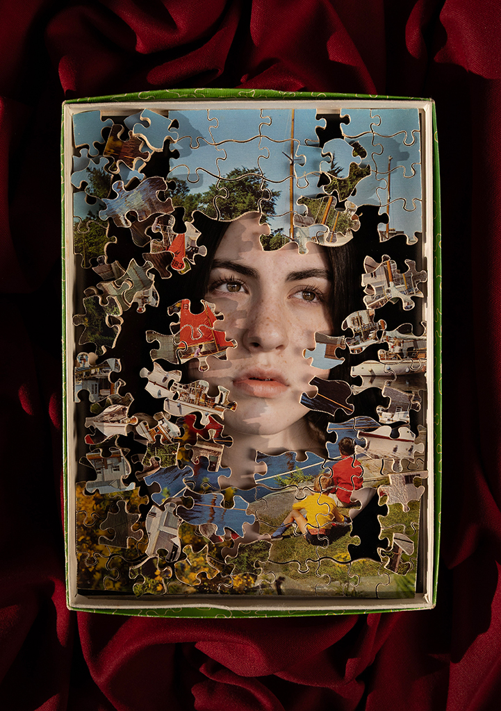 collage portrait of a womans face surrounded by puzzle pieces