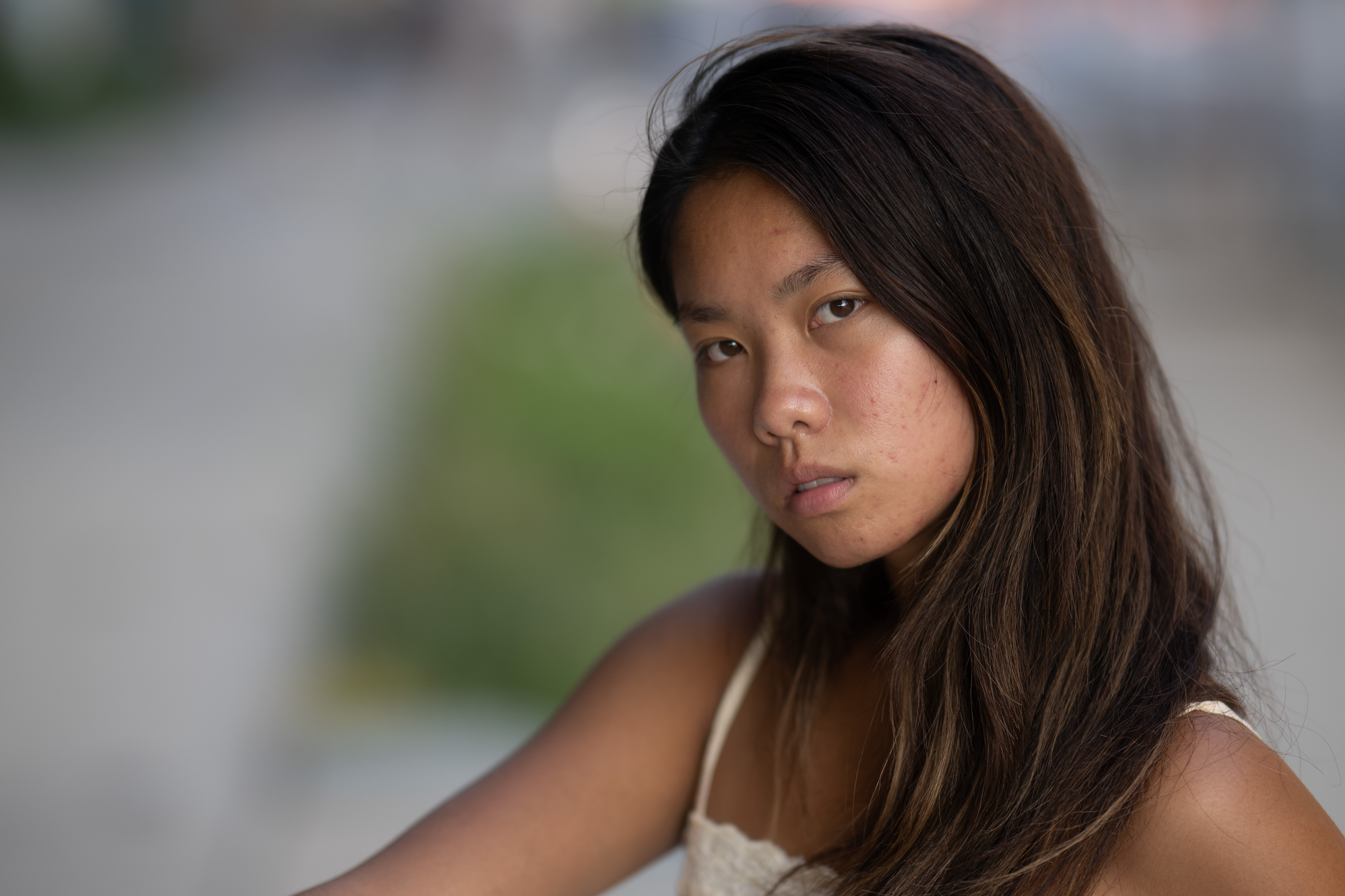 Nikon 85mm f/1.2 lens sample portrait of a young woman