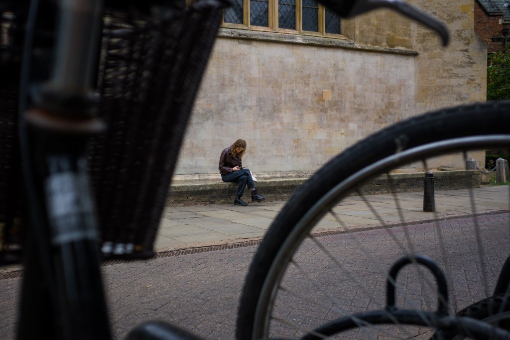 Ricoh GR IV seated figure street sample image. Image credit: Matty Graham