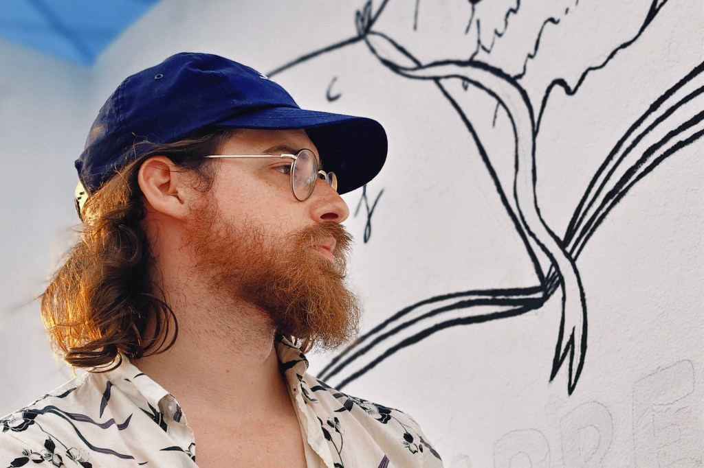 Vivo V60 portrait sample image, man in blue baseball hat