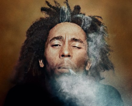 Burning, 1973. Colour photograph of Bob Marley with a spliff between his fingers. Image Credit: Dennis Morris SINGLE USE ONLY
