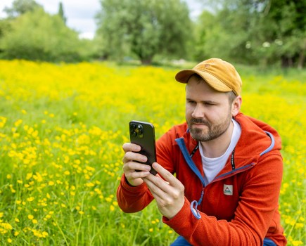 Dan Mold using an iPhone